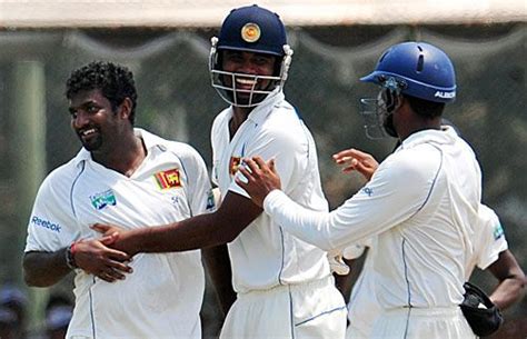 Muttiah Muralitharan Celebrates The Wicket Of Jesse Ryder