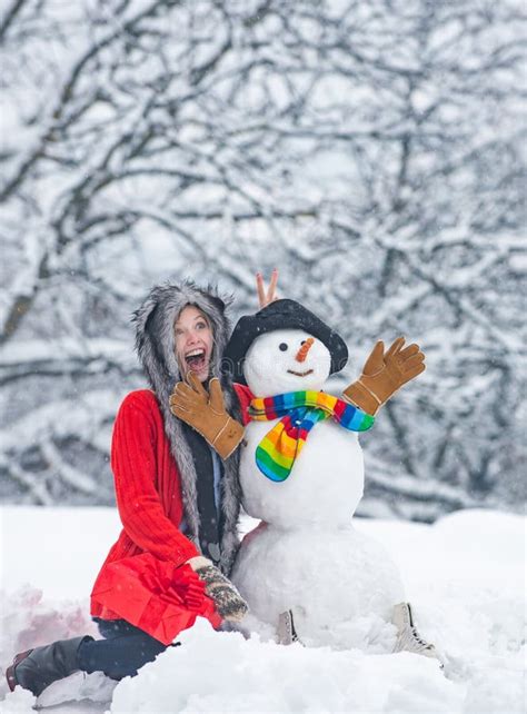 People in Snow. Snowman. Funny Winter People Portrait. Snowman and ...