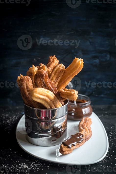 Sweet chocolate churros 23573549 Stock Photo at Vecteezy