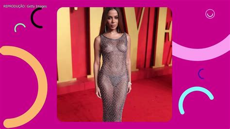 Vídeo Anitta ousa look transparente e deixa seios à mostra em