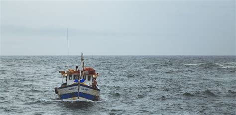 A Fishing Boat on the Ocean · Free Stock Photo