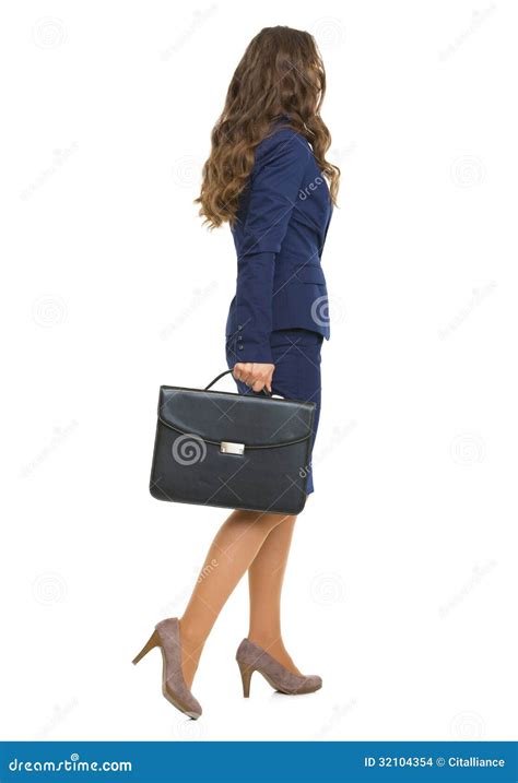 Full Length Portrait Of Business Woman With Briefcase Going Stock Photo