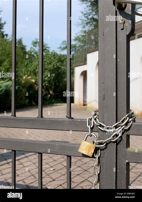 Locked gate Stock Photo - Alamy