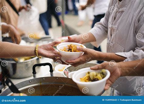 Help Serving Free Food To The Poor Needy Concept Sharing Food With