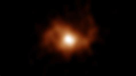 Oldest spiral galaxy in the universe captured in fuzzy photo | Live Science