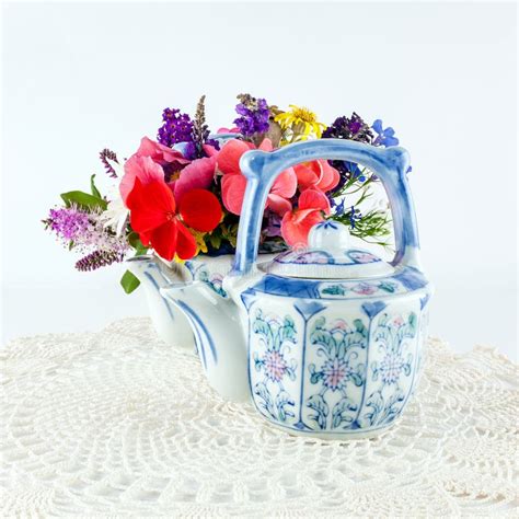 Teapots with flowers stock image. Image of table, floral - 56996683