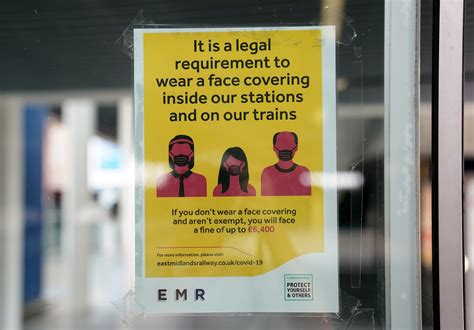 Covid scientists say they will continue wearing face masks after