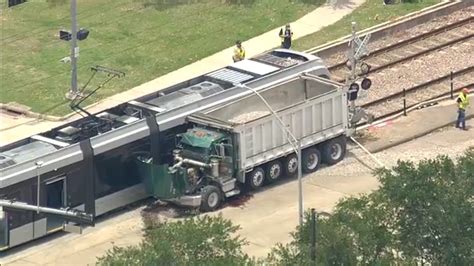 Metrorail Car Heavy Truck Collide On Train Tracks Near Nrg Stadium