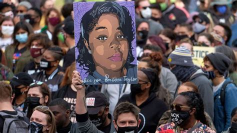 A year after her death, protesters take to the streets to demand ...