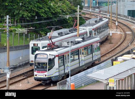 Mtr Light Rail Vehicles Next To Tuen Mun Park Hong Kong Stock Photo