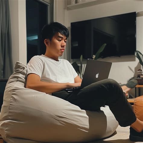 Free Focused Homework Session Image - Man, Laptop, Bean Bag | Download ...