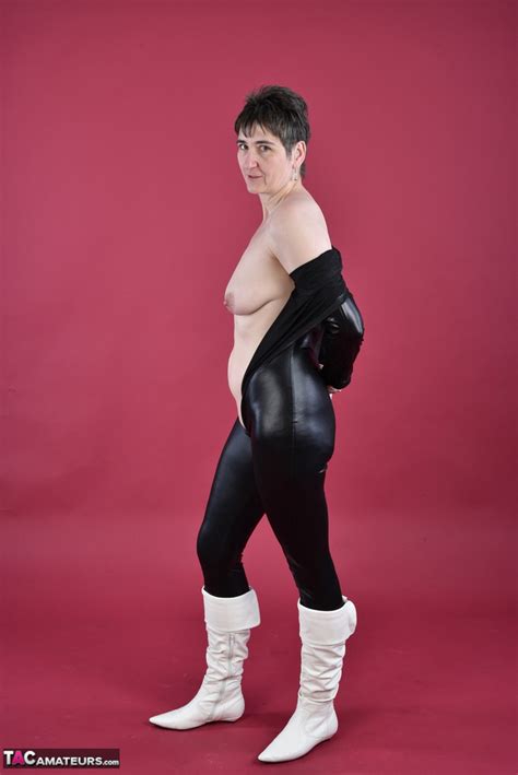 Solo Model Hot Milf Unzips A Catsuit To Expose Her Tits And Twatin Boots Coedcherry