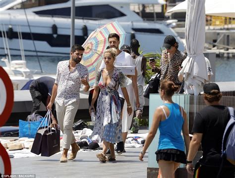 Rita Ora Parades Her Phenomenal Physique In A Tiny Gold Bikini Daily Mail Online