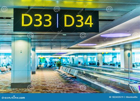 Interior of Airport Terminal with the Sign Depicting Gate Number Stock ...