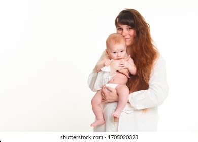 A Long Haired Brunette Holding Her Baby Images Stock Photos Vectors Shutterstock