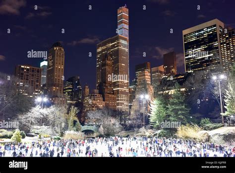 NEW YORK CITY - DECEMBER 25, 2014: Trump Wollman Skating Rink at night ...