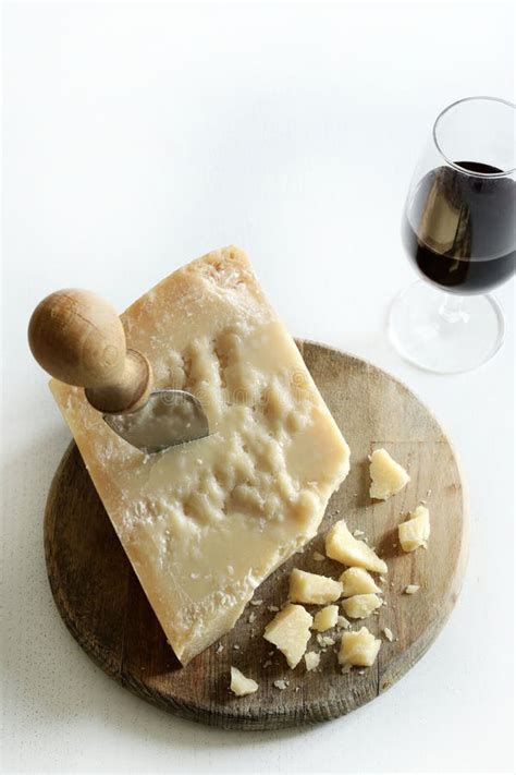 Italian Parmesan Or Parmigiano Reggiano Cheese And Red Wine Stock