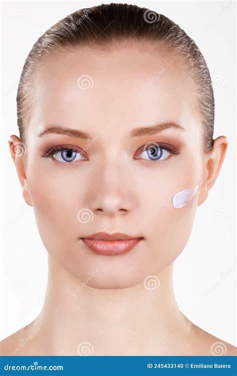 Charming Girl With Moisturizing Lotion On Her Cheek Nude Lips Natural Makeup Stock Photo