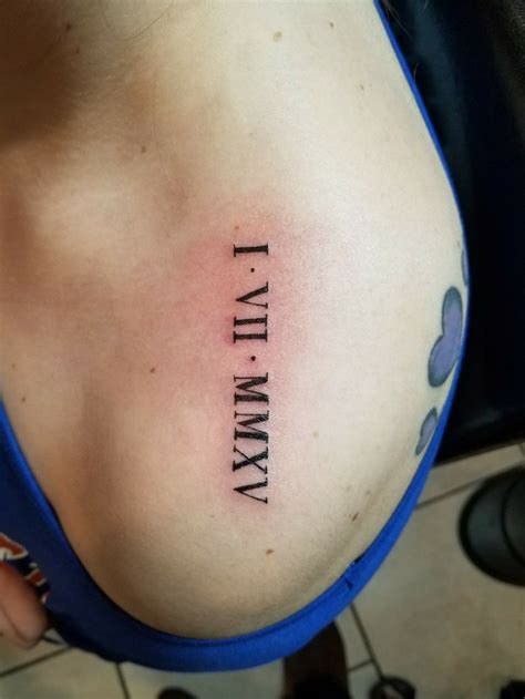 Roman Numerals Tattoo Ribs