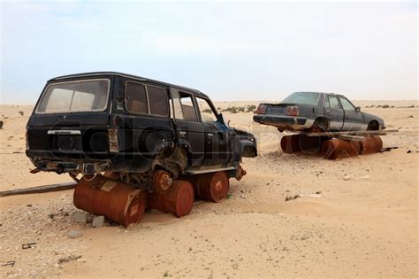 Abandoned cars in the desert. Qatar, ... | Stock image | Colourbox