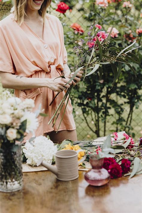 Woman Arranging Flowers Garden Premium Photo Rawpixel