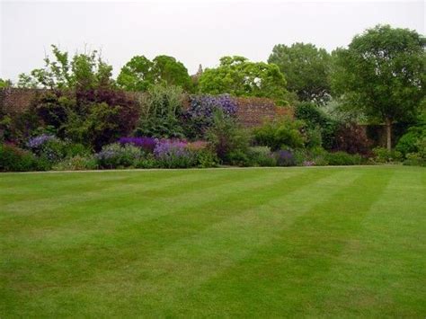 Vita Sackville West English Garden Design Brick Wall Deep Purple