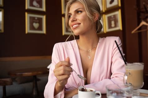 Premium Photo Beautiful Blonde Woman Sitting In Cafe