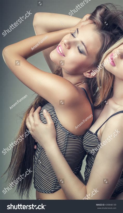 Two Beautiful Sexy Lesbian Women Erotic Stock Photo