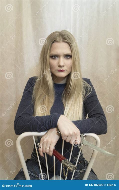 Beautiful Young Girl With A Dagger Stock Image Image Of Long Chair