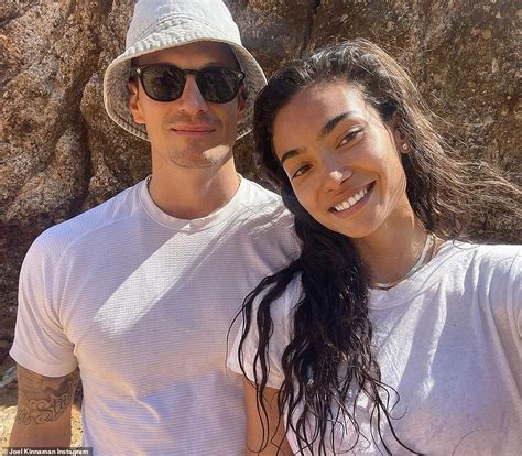 Kelly Gale, 26, passionately embraces her fiance Joel Kinnaman, 42