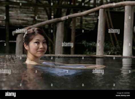 Woman Soaking In Hot Tub Stock Photo Alamy