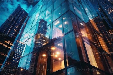 Office Buildings In Financial District With Night Lights And Sky