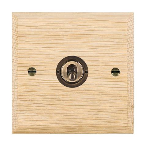 Hamilton Woods Chamfered Light Oak 1 Gang 20ax 2 Way Toggle Switch With Antique Brass Toggle Ukes