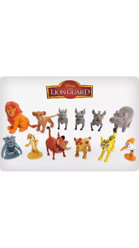 The Lion Guard Figurines Are On Display In Front Of A White Card Board