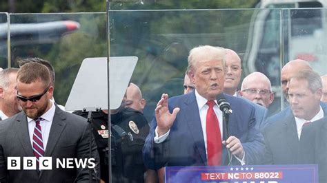 Donald Trump Speaks Behind Bullet Proof Glass At Rally