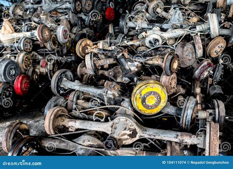 Used and Old Car Wheel Axle in the Recycle Garage. Stock Photo - Image