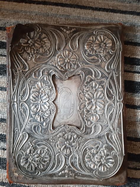 What is this old silver book cover or binder thing? It's an heirloom ...