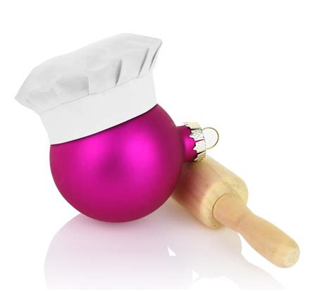 Premium Photo Christmas Ball With Chef Hat And Rolling Pin