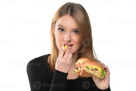 Portrait Of A Beautiful Funny Young Girl Eating Hamburger 15975674