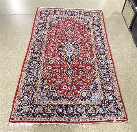 Lot 104in Traditional Persian Style Fringed Area Rug