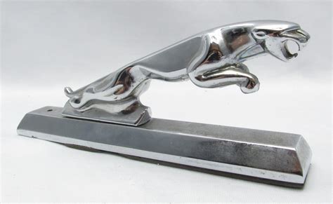 At Auction: JAGUAR FIGURINE - AN OLD CAR SYMBOL