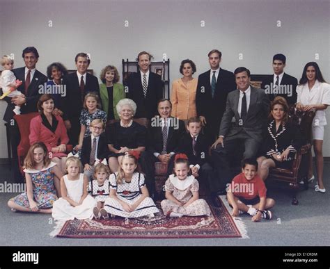 President George H. W. Bush and wife Barbara pose with their six ...