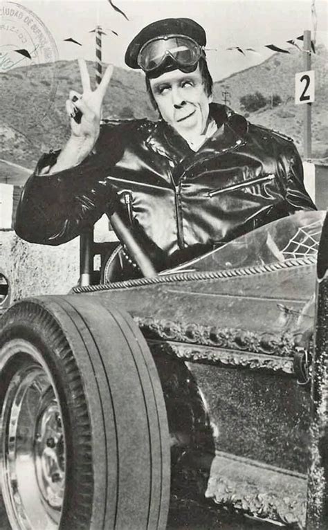 Herman Munster Sitting In Grandpa Munsters Dragula Coffin Roadster