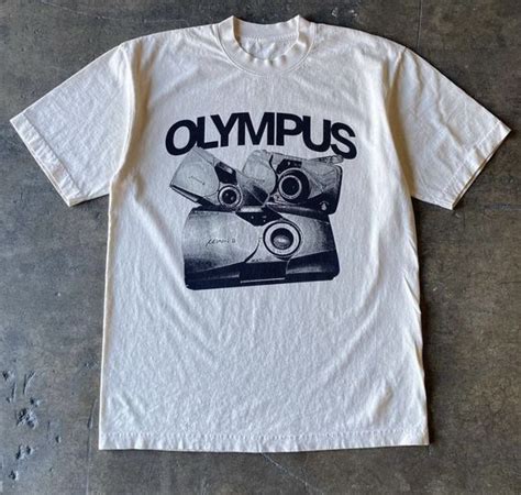 Olympus TShirt - Tshirtfash in 2024 | T shirt, Short sleeve tee shirts ...