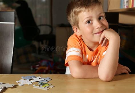 Boy Assembling Puzzles Stock Photos Free Royalty Free Stock Photos