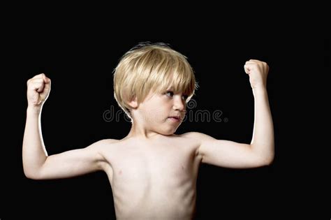 Little Boy Flexing His Muscles Stock Image - Image: 26453693