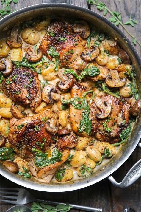 Creamy Chicken Gnocchi With Spinach And Mushrooms In A Stainless Steel