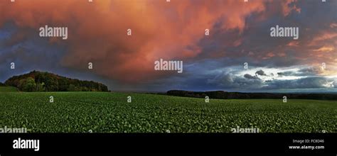 Storm clouds at sunset Stock Photo - Alamy