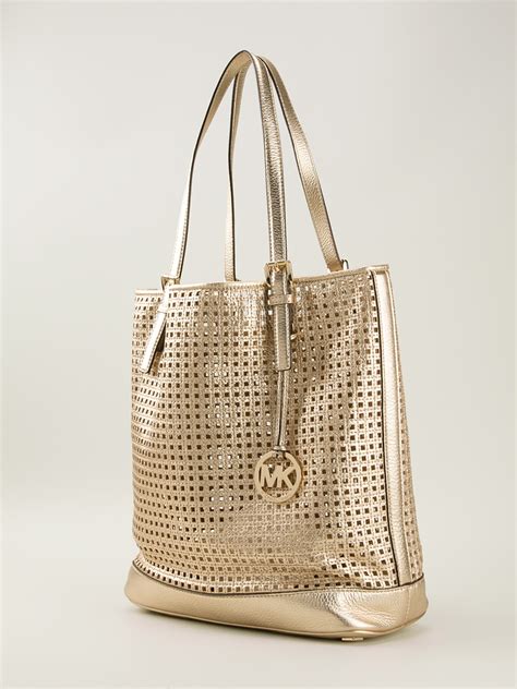 Michael Michael Kors Perforated Shopper Tote In Metallic Lyst