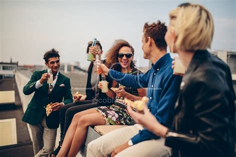 Group Of Young Adults Drinking Outdoors Jacob Lund Photography Store